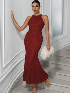 Detailed view of the sparkling burgundy sequin halter neck evening gown with fishtail hem