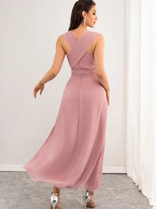 Pink chiffon evening dress with cross back straps and flowing high-waist empire cut