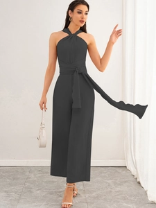 Deep grey halter neck jumpsuit with wide leg cut and matching waist tie belt