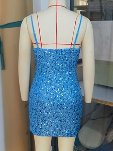 Close-up detail of the back hidden zipper on royal blue sequin mini party dress