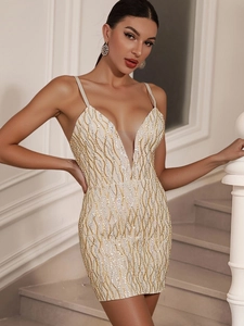 Slim fit mini dress with gold and silver wave sequins and a deep V-neckline for parties