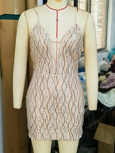 Sleeveless bodycon party dress with gold and silver wave sequins and deep V-neckline