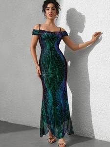 Detail of sequined long evening dress with peacock gradient pattern and slim fit design