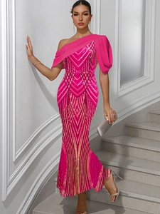 Detail of rose pink chiffon draping and gold sequin mermaid dress with sequin pattern