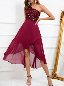 Detail of burgundy one-shoulder sequin bodice and high-low layered chiffon skirt dress
