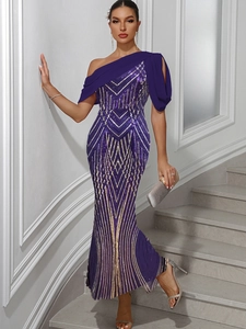 Detailed view of the purple one-shoulder sequin dress with elegant mermaid fishtail hemline