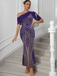 Detail of sequined long evening dress with elegant one-shoulder chiffon drape in deep purple