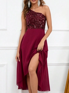 Detail of burgundy one-shoulder sequin bodice and flowing chiffon skirt with high slit