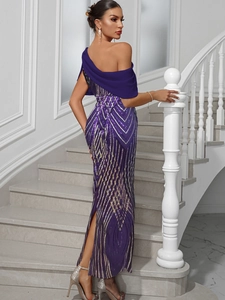 Detail of purple sequin dress with gold geometric patterns and pleated chiffon shoulder