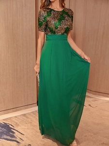 Detail of elegant sequin embroidery and high waist pleated chiffon evening dress skirt