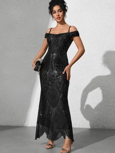 Close-up of sparkling black sequins and geometric pattern on slim fit evening dress