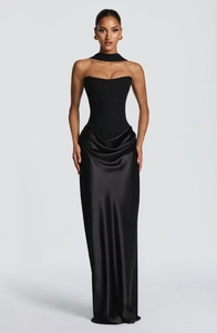Detail of elegant black satin evening dress with strapless corset and matching neck strap