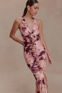 Detail of pink marble print halter dress with ruffled waist and rose knot decoration
