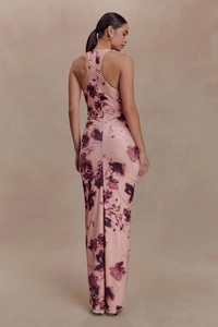 Detail of racerback slim fit maxi dress featuring purple floral print on pink fabric