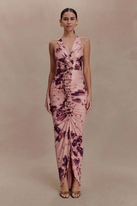 Detail of ruched tie-dye halter dress featuring vertical ruffles and slim fit design