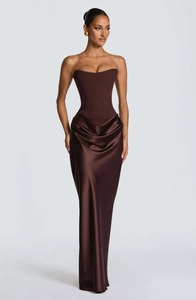 Detail of chocolate satin corset bodice and elegant draped waist on long evening dress