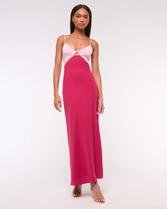 Close-up of pink and deep magenta contrast maxi dress with sleek backless detail