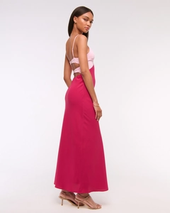 Detail view of pink contrast maxi dress featuring a slim fit and open back design
