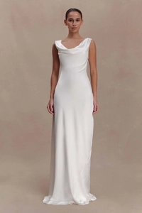 Close-up detail of white satin evening dress featuring an elegant cowl neck design