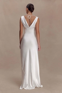 Elegant white satin maxi dress featuring a low back design with delicate bow-tie detailing