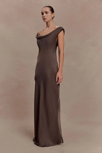 Detail of elegant chocolate brown satin dress featuring a draped cowl neck and silk texture