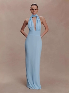 Elegant light blue halter neck maxi dress with backless design and slim fit silhouette