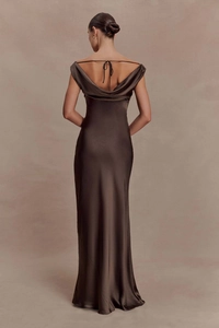 Detail of elegant chocolate satin maxi dress featuring an open back with thin tie-up straps