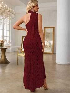 Detailed close-up of a burgundy sequin fishtail dress with one-shoulder ribbon detail