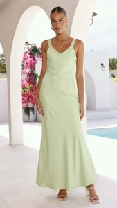 Detailed view of mint green satin slip dress with elegant fishtail hem and V-neckline