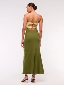 Slim fit backless maxi dress with yellow top and olive green skirt featuring metal buckles