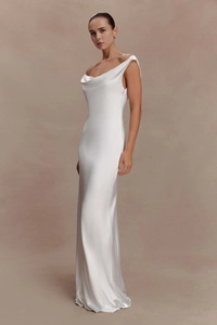 Detail of white satin dress featuring a cowl neck design and elegant slim-fit tailoring