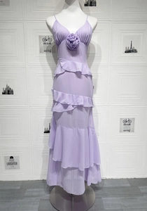 Detailed close-up of light purple dress with 3D floral rose and ruffled chiffon layers
