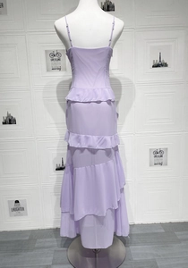 Detail of lavender tiered ruffle maxi dress with spaghetti straps and open back design