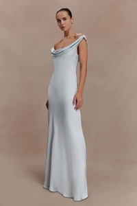 Close-up of the elegant cowl neck and silky satin texture of this light blue evening gown