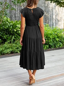 Rear view of black tiered midi dress with ruffle sleeves and shirred waist detail