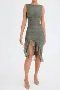 Detail view of sage green sleeveless dress featuring ruched fabric and asymmetric hem