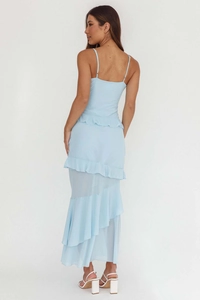 Back view of light blue tiered ruffle maxi dress with spaghetti straps and sheer hem
