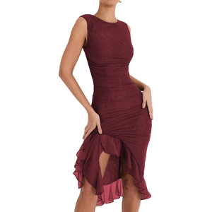 Detailed macro view of the wine red ruched fabric and asymmetric ruffle hem of the dress
