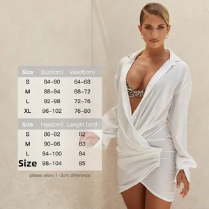 Detailed size chart for white long sleeve deep V-neck dress with bust and waist measurements