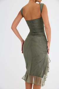Close-up of the olive green ruched mesh dress back with invisible zipper and ruffles