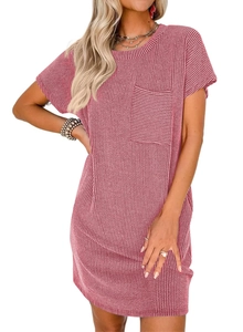 Detail showing the ribbed knit texture and chest pocket of the pink short sleeve dress
