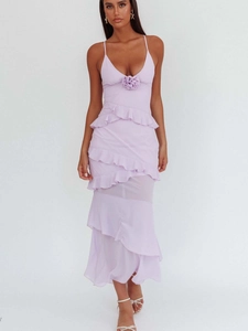 Lavender backless maxi dress with ruffled tiers and floral accents for summer
