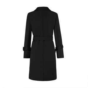 Back view of classic black double-breasted trench coat with waist tie belt and cuff straps