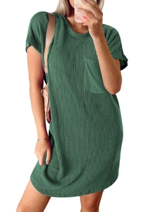 Detail of green short sleeve dress with chest pocket and ribbed texture fabric