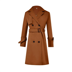 Detail view of a double-breasted trench coat with adjustable waist belt and buckled cuffs