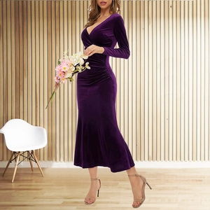 Detailed close-up of ruched side texture on a velvet V-neck elegant evening gown