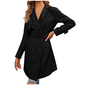 Detail of classic double-breasted black trench coat with waist belt and wide lapels