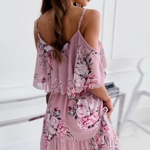 Detail of pink floral off-the-shoulder chiffon dress showing ruffle sleeves and open back