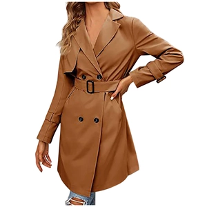 Close-up of classic camel double-breasted trench coat with waist belt and lapel detail