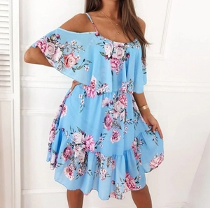 Detail view of floral print chiffon dress with cold shoulder design and ruffled layers